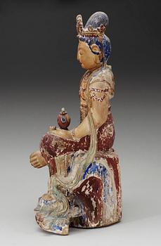 A seated wooden figure of Guanyin, Yuan/Ming dynasty.
