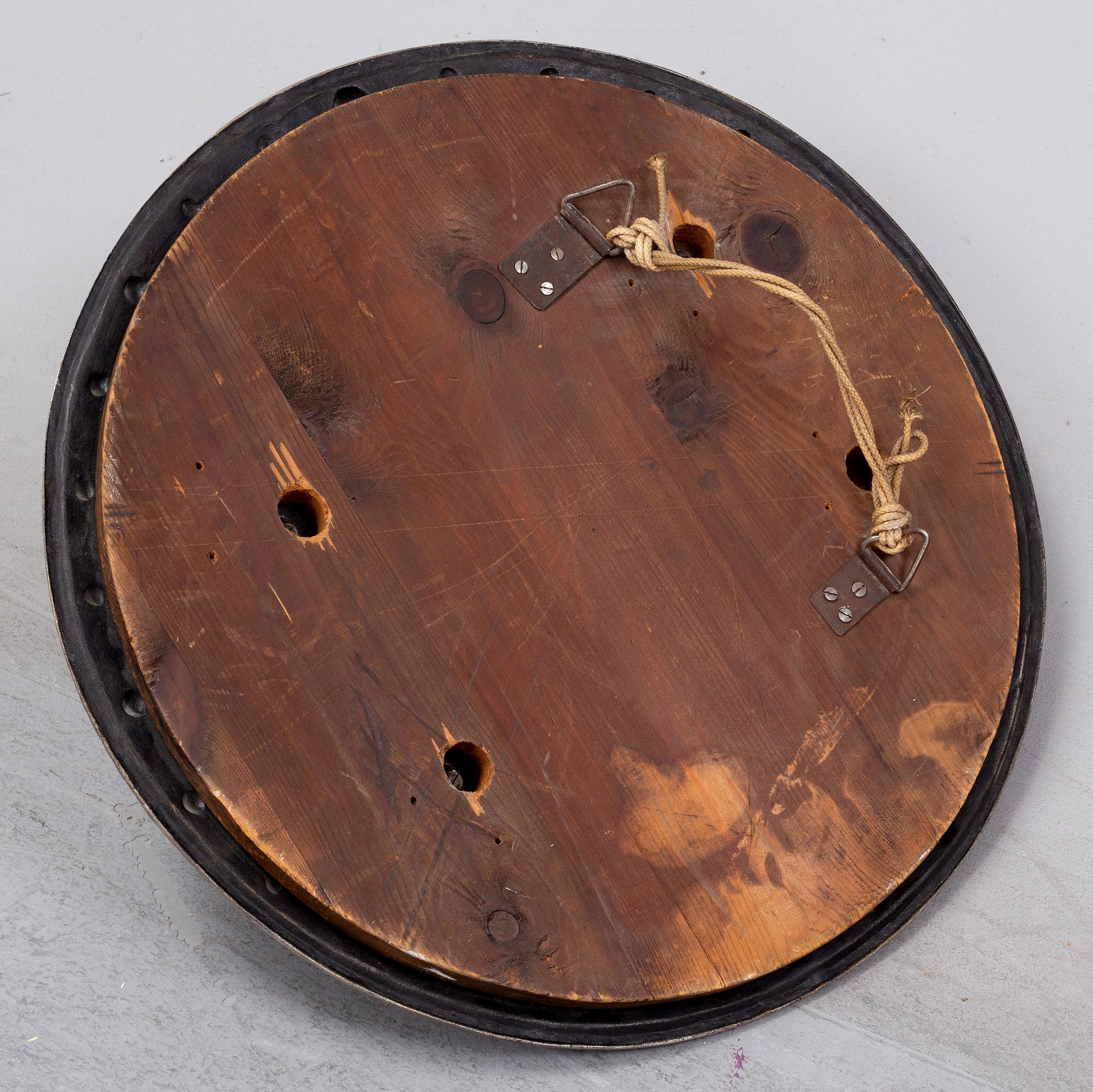 A decorative iron sheild, circa 1900.