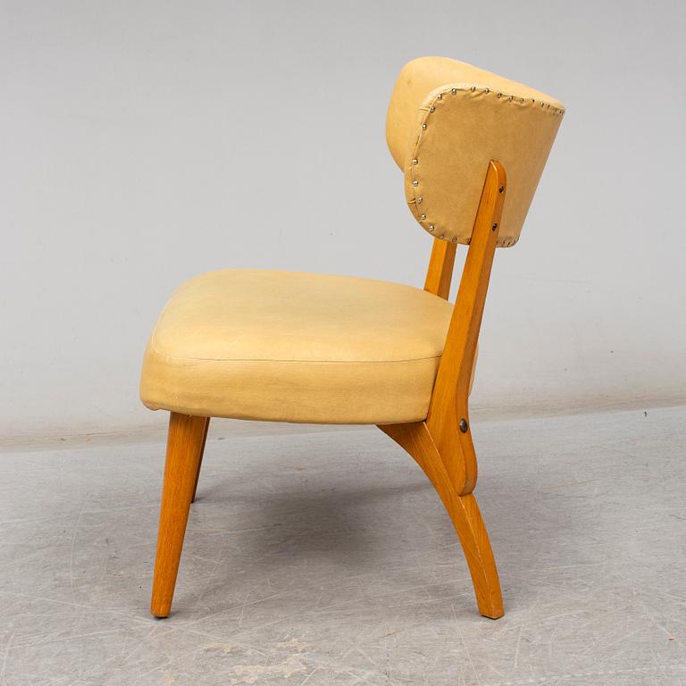 an armchair from the mid 20th century.