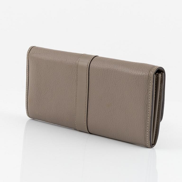 Louis Vuitton, A Suhali leather 'Le Favori Verone Wallet'.