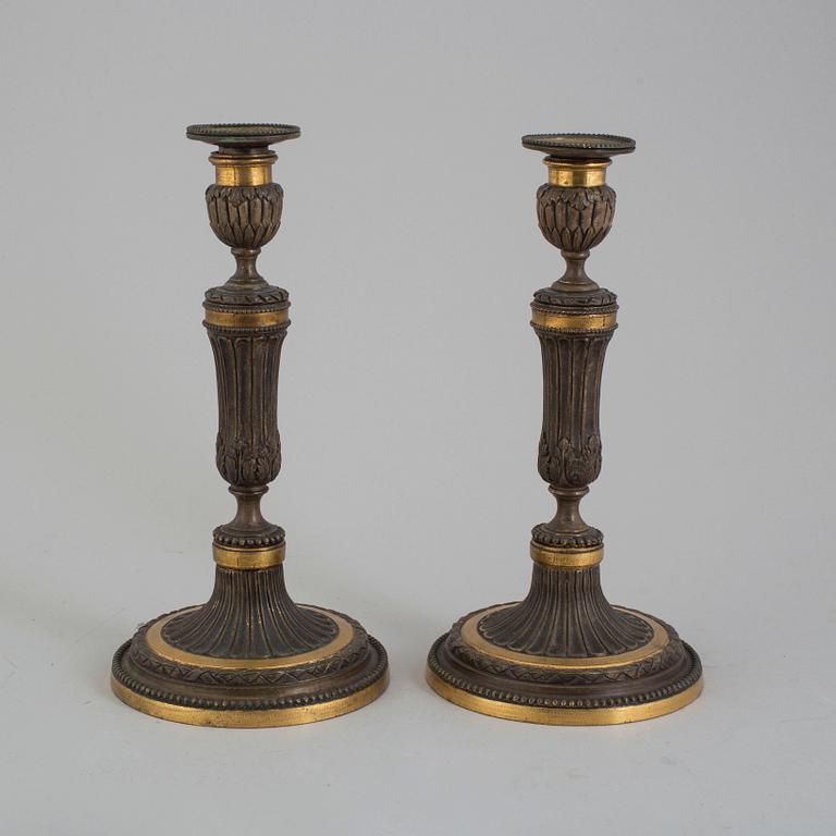 A pair of late 18th century Louis XVI bronze candlesticks, France.