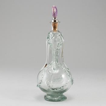 A glass bottle, 18/19th Century.