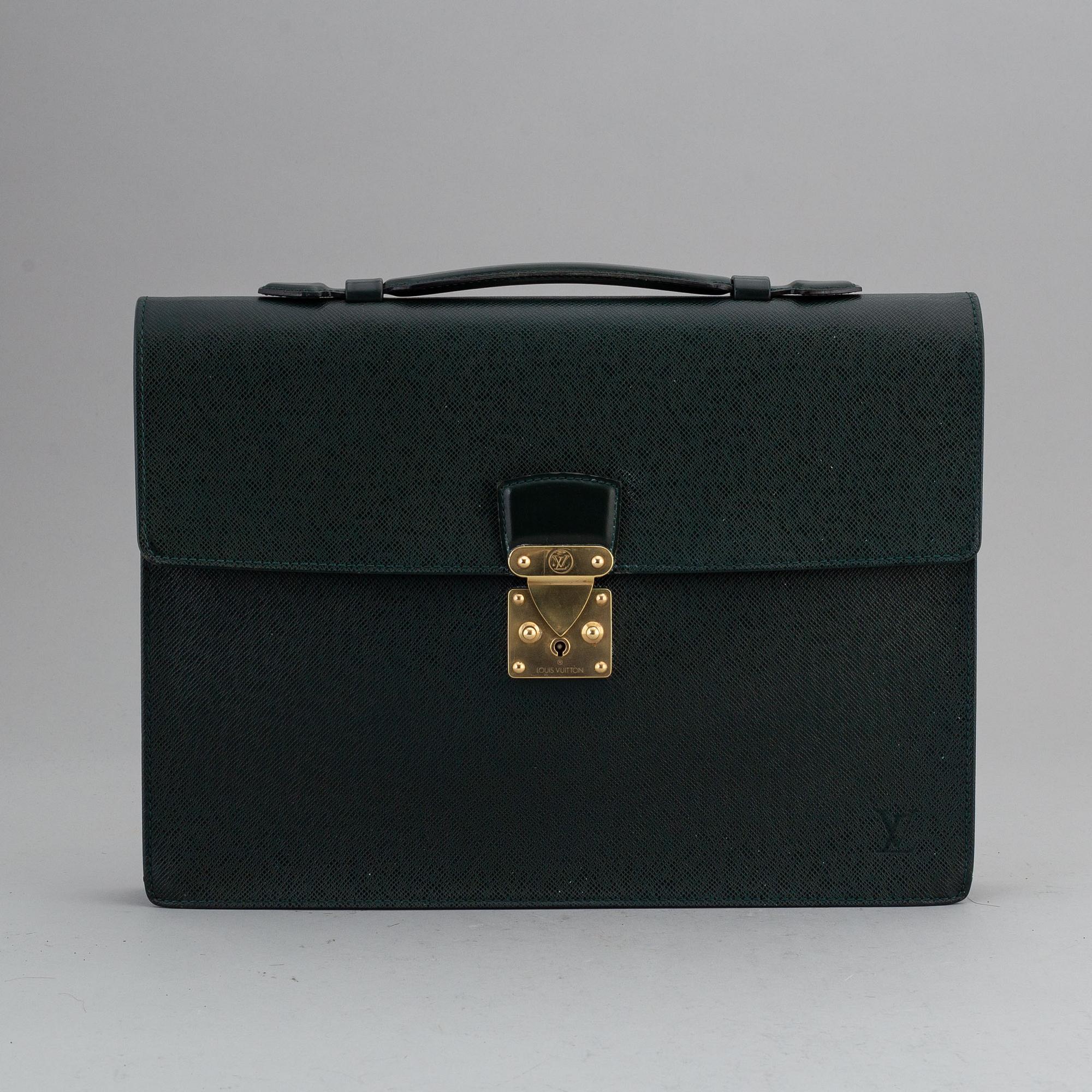 LOUIS VUITTON, a 'Taiga Serviette Kourad' briefcase.