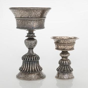 Two silver butter lamps, Tibet, 19th century.