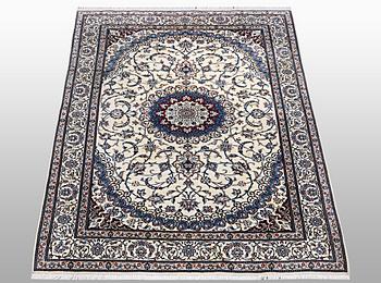 A rug, Nain, Part Silk, sk 6 LAA, ca 204 x 137 cm.