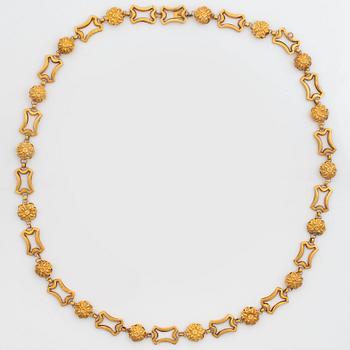 1100. An 18K gold necklace.