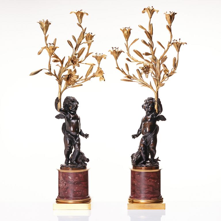 A pair of Louis XV/ Louis XVI five-light candelabra, second part of the 18th century.
