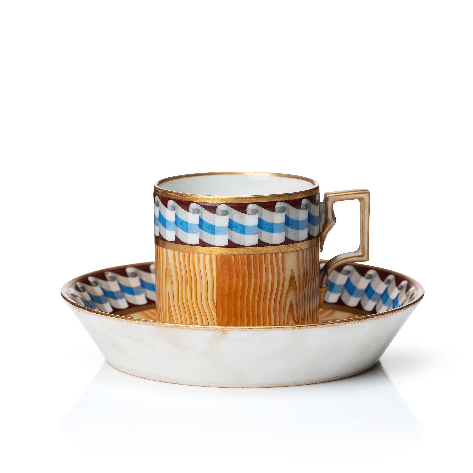 A Vienna faux bois decorated cup with stand, late 18th Century.