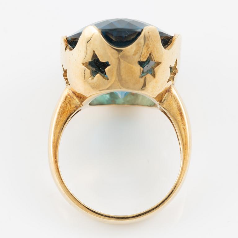 Ring, cocktail ring, 18K gold with blue topaz.