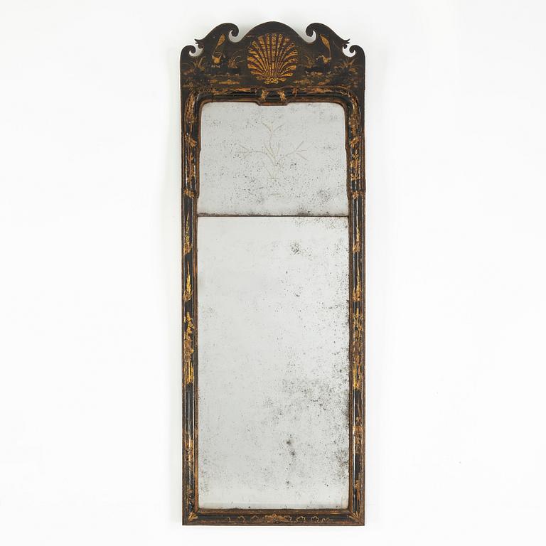 A Geroge II style mirror with 18th Century glass and later frame.