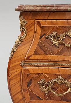 A rosewood-veneered and ormolu-mounted Rococo chest of drawers by J. Wahlbeck (master 1760-1782).