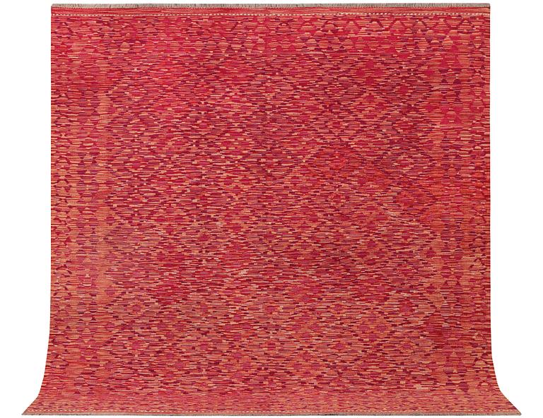 A Kilim rug, c. 200 x 199 cm.