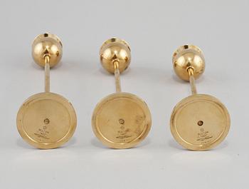 LJUSSTAKAR, 3 st, mässing, "Tulpan", Pierre Forsell, Skultuna, 1900-talets andra hälft.