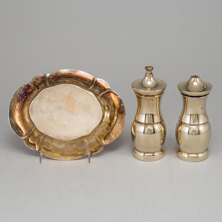 A pair of Tiffany & Co. silver-gilt sterling silver salt- and pepper grinder set.