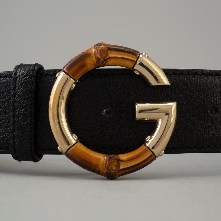 GUCCI, a leather and canvas belt, size 80/32.