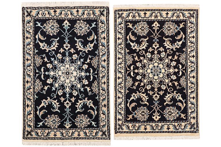 A pair of rugs, Nain, part silk, ca. 93 x 60 cm & ca. 87 x 58 cm.