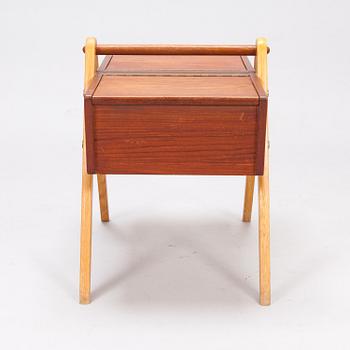 A 1950's sewing table in teak.