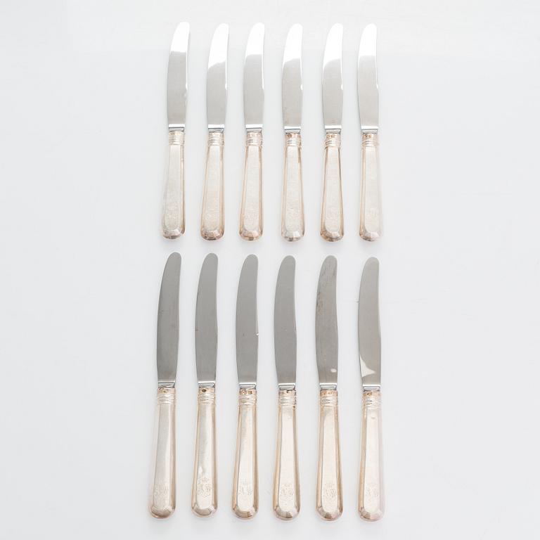 A 24-piece set of silver cutlery, Saint Petersburg 1870. Maker's mark A.K.