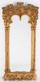 A late 19th century bronzed mirror.