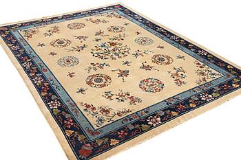 A semi-antique carpet, China, ca 360 x 272 cm.