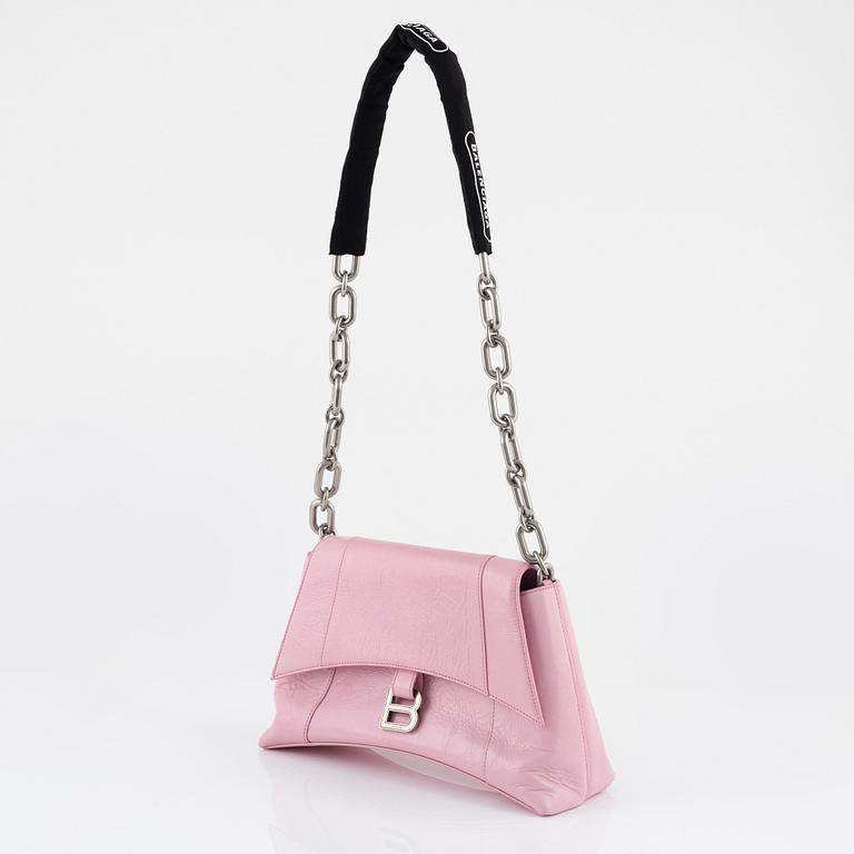 Balenciaga, a pink leather 'Downtown' bag.
