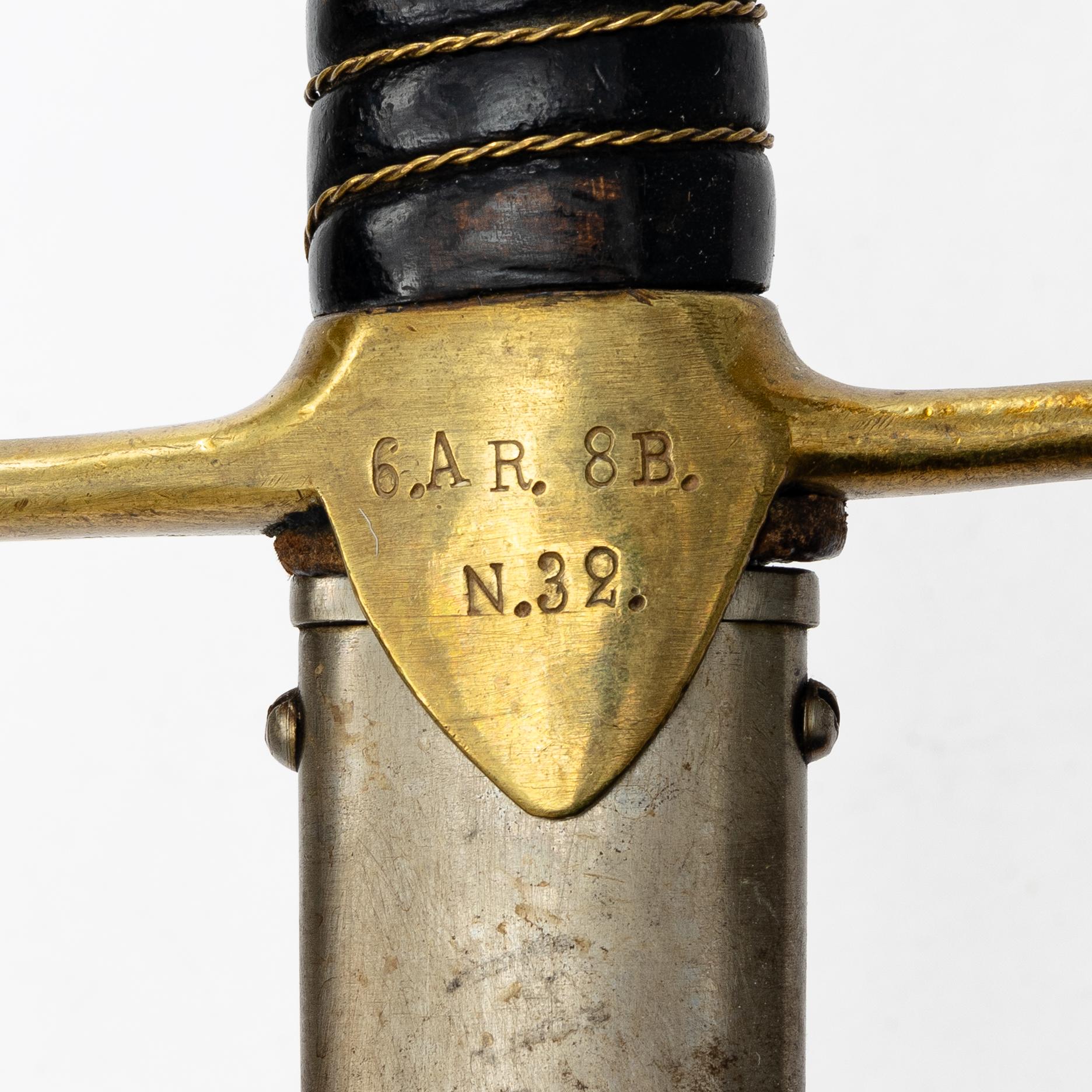 A Swedish artillery saber 1889 pattern with scabbard.