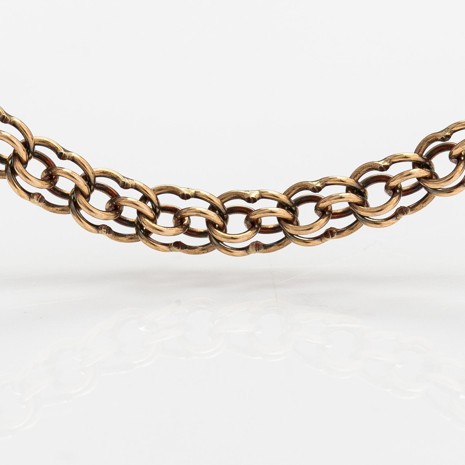 A 14K gold necklace. Aittamäki Ky, Nurmisjärvi 1992.