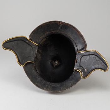 A 20th century replica helmet.