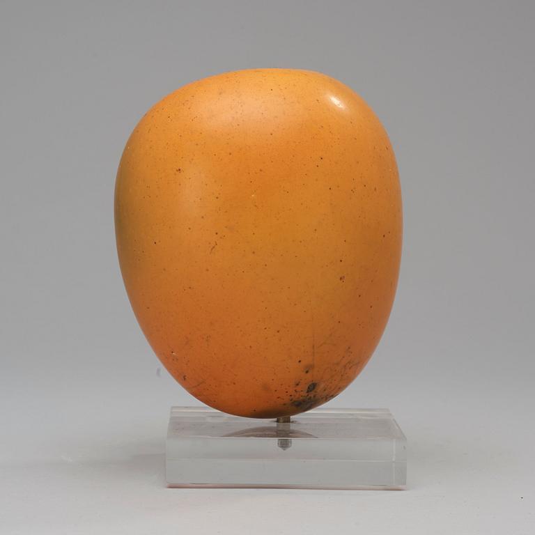 A Hans Hedberg faience sculpture of a plum, Biot, France.