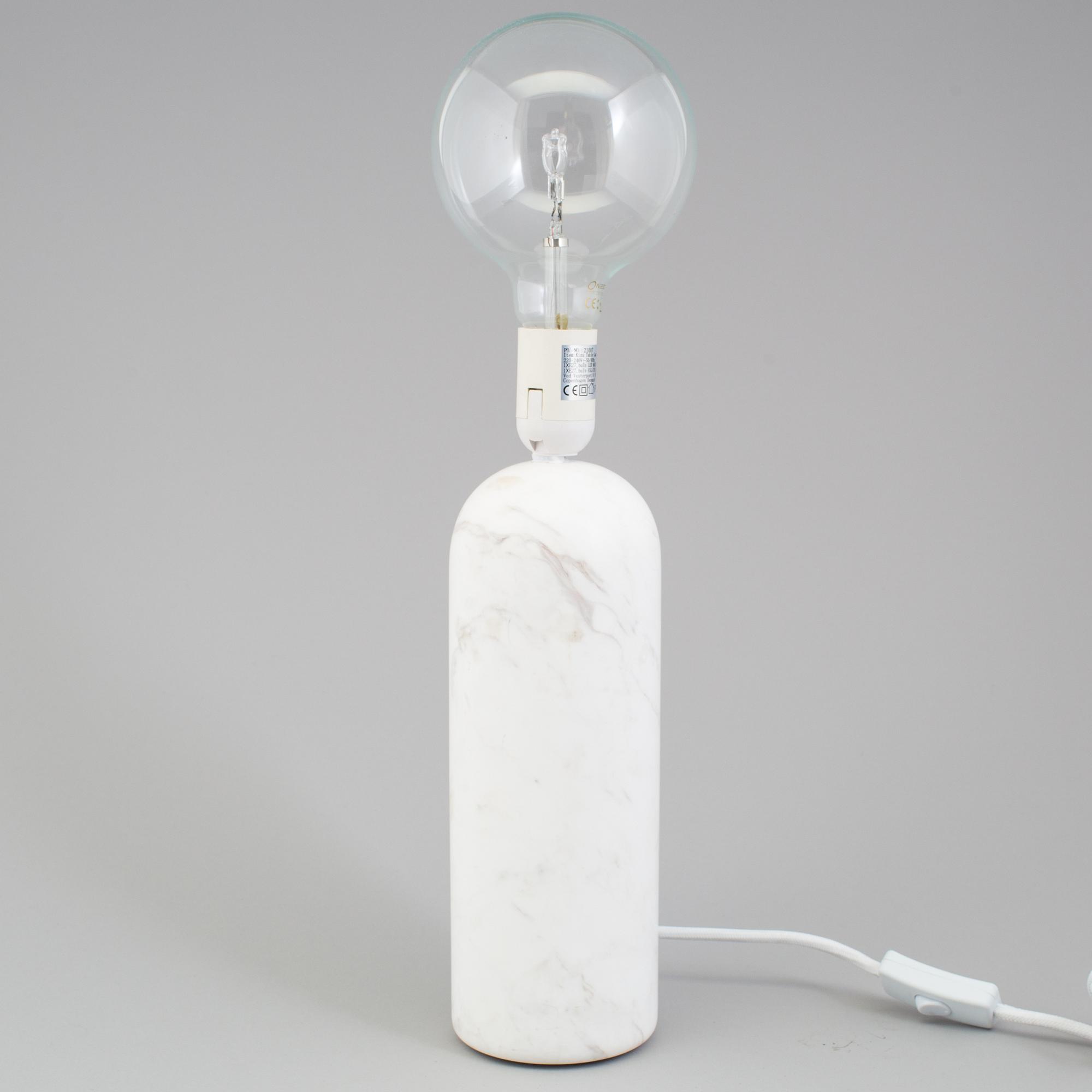 a "Kizu" table lamp by Lars Tornoe for New works.