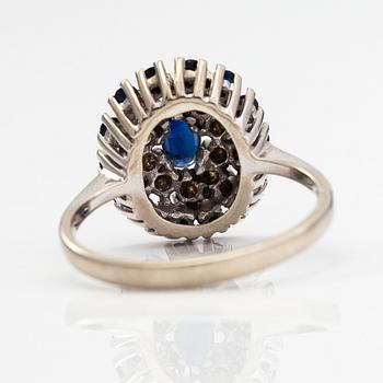 A 14K white gold ring with diamonds ca. 0.30 ct in total and sapphires. Tmi Hyvärinen M., Turku 1989.