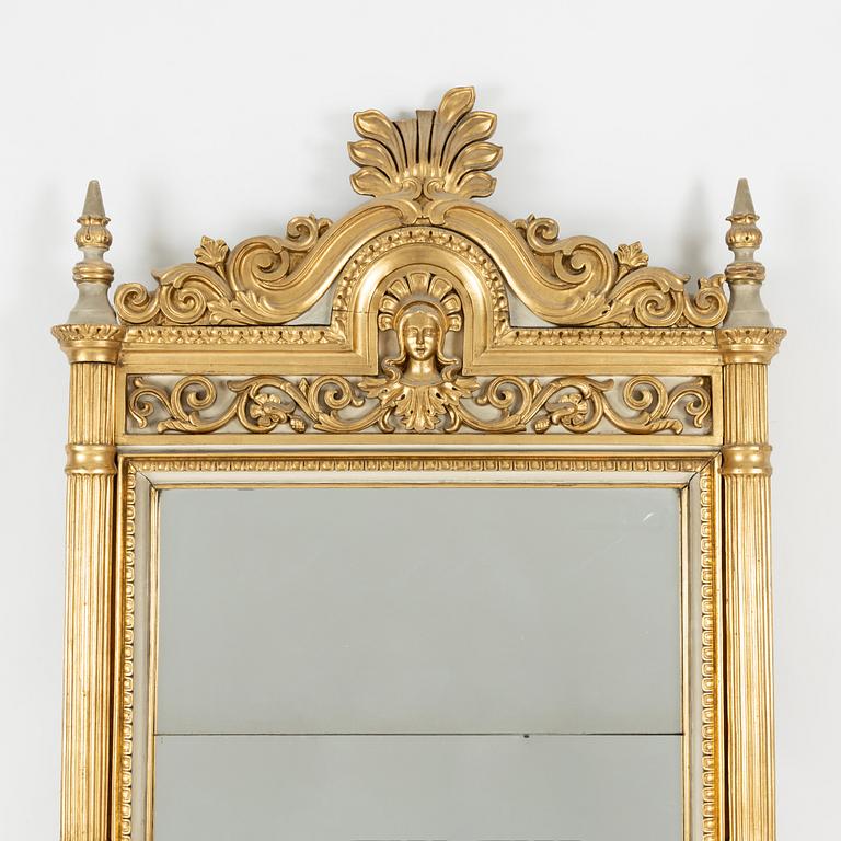 A Empire style mirror, second half of the 19th Century.