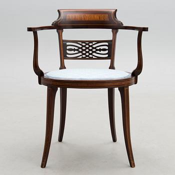 An Edward VII mahogany open armchair, circa 1900.