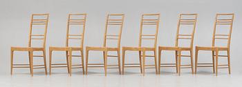 A set of six Erik Chambert 'Poem' birch and rattan dining chairs, Chambert's, Norrköping, Sweden, probably 1950's.