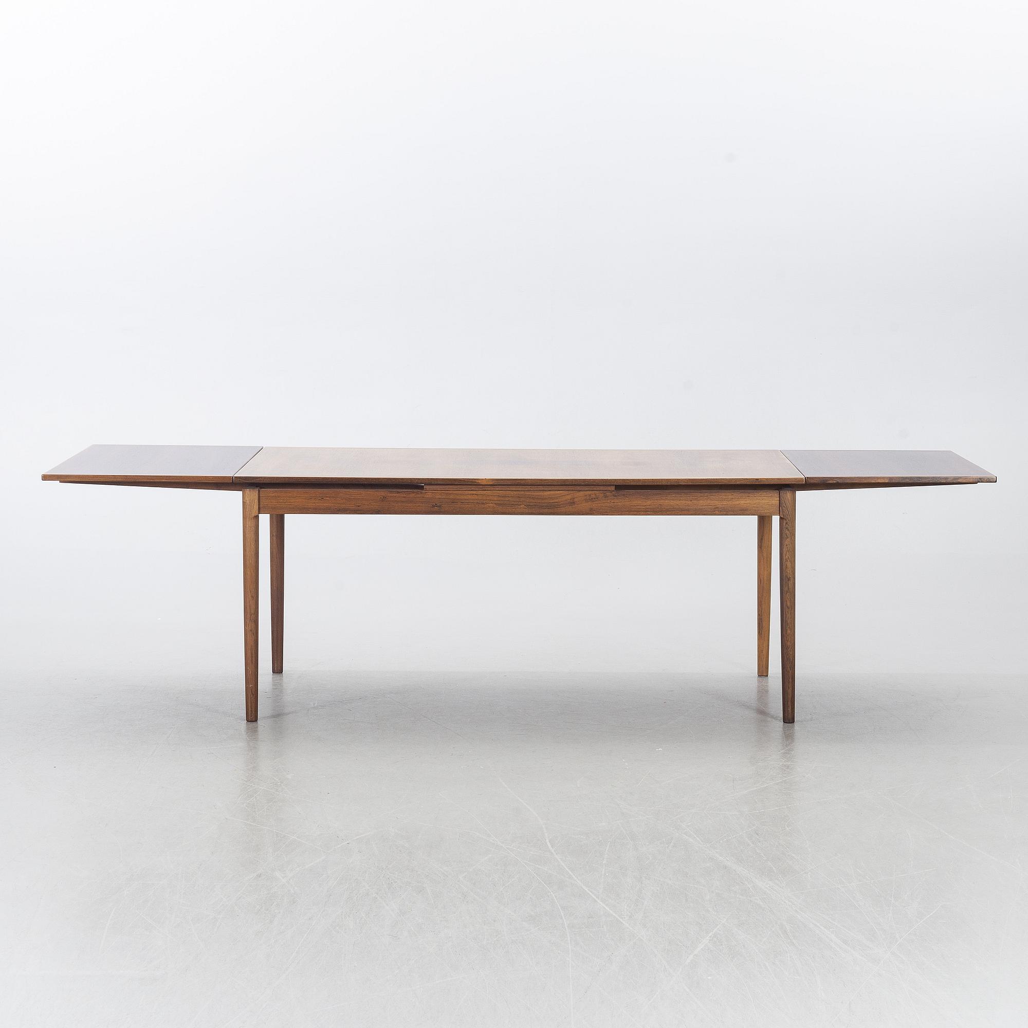 A Table from Slagelse Möbelvaerk A/S and 4 chairs, Niels Otto Møller, JL Møller. Denmark, 1960's.