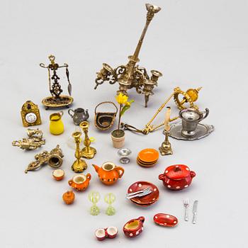 A set of ca 40 pieces of doll house furniture and accessories, including Waltershausen, Germany, 19/20th century.