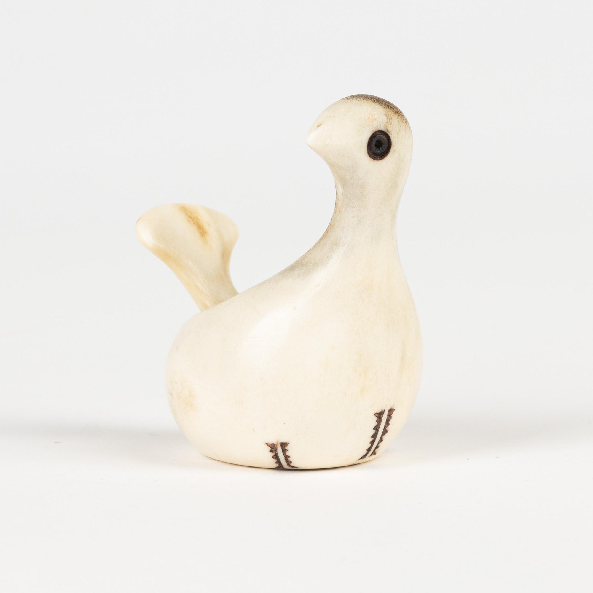 A horn salt bowl by Lars Pirak signed.
