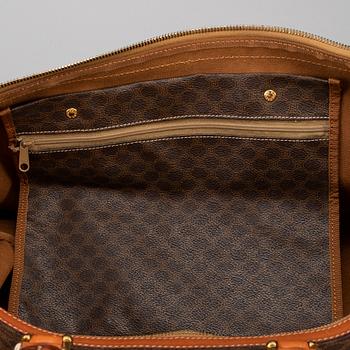 CÉLINE, a 'Macadam Duffle' bag.