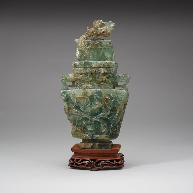 A Chinese carved fluorite vase with cover, 20th Century.