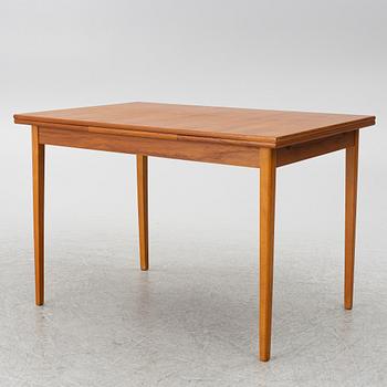 A mid20th century dining table.