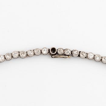 An 18K white gold and old-cut diamond rivière necklace.