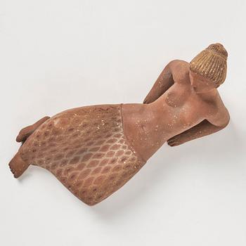 Stig Lindberg, a chamotte stoneware sculpture of a reclining woman, Gustavsberg studio, Sweden mid-20th century.