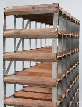 A wine rack from Farrow & Jackson, England, 20th century.