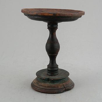 A 19th century wooden butter stand.