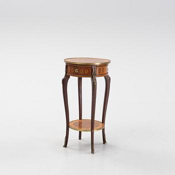 A rococo style table, circa 1900.