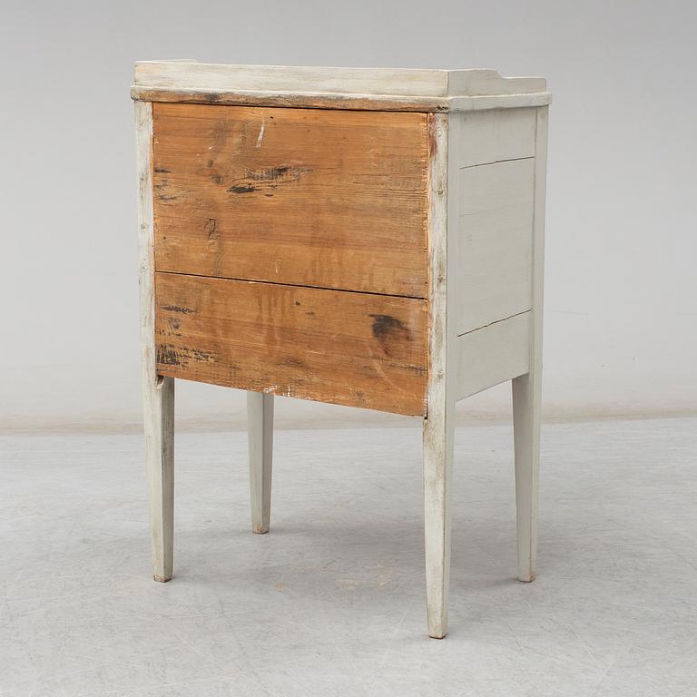 A later part of the 19th century Gustavian style bedside cabinet.