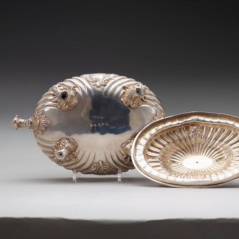 A pair of English mid 18th century silver tureens, marks of Frederick Kandler, London 1755.