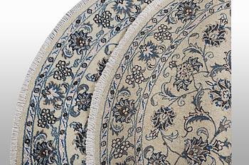 A rug, Nain, part silk, ca 316 x 136 cm.