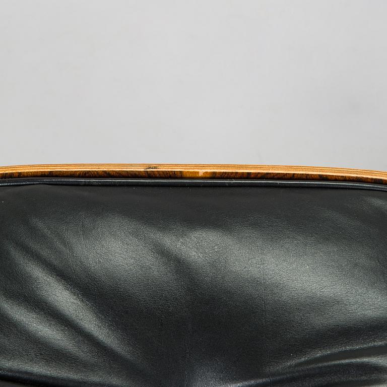 Charles & Ray Eames, 'Lounge chair' and ottoman, licensed by Mobilier International France, 1977.