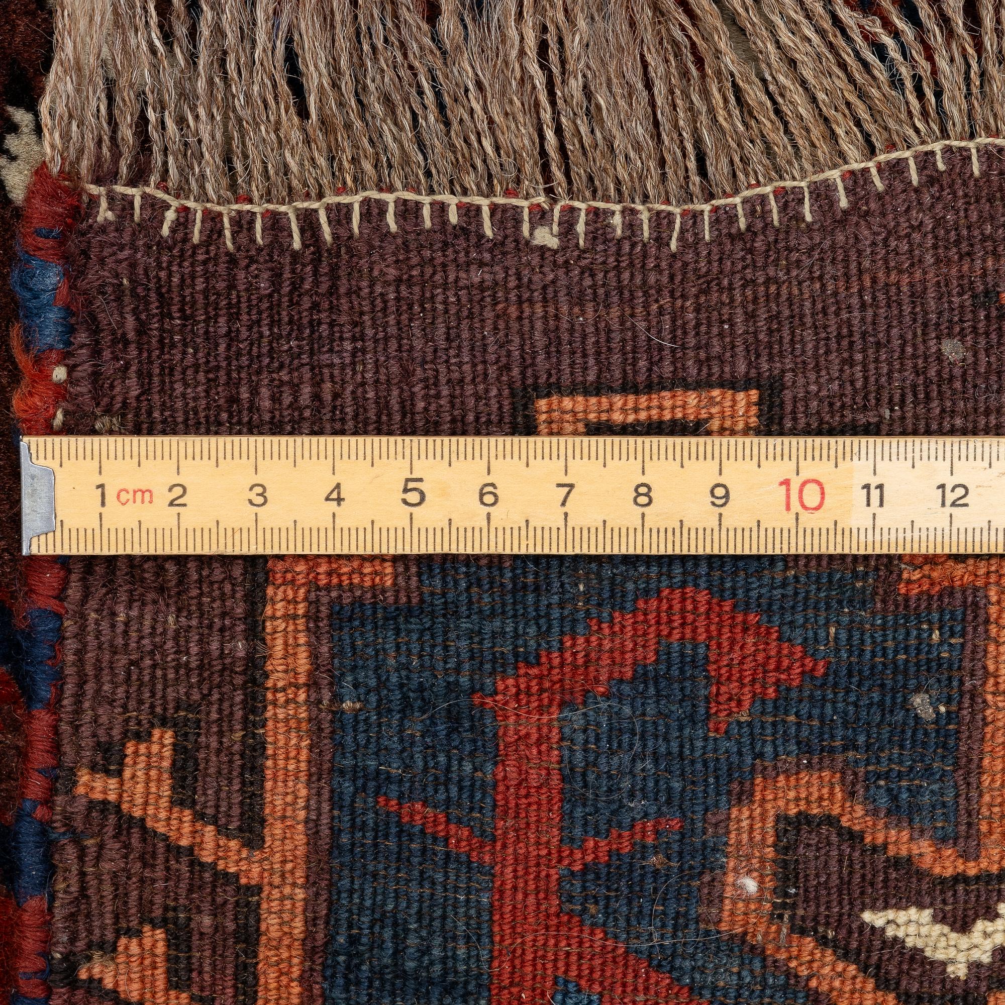 An antique Yomut main carpet, West Turkmenistan, c. 303 x 179 cm.